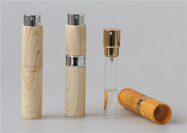 Travel Size Twist And Spritz Atomiser 10ml Plastic Mini Spray Bottle Wood Grain Surface